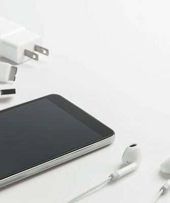 Smartphones with earphones and charger